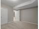 Basement bedroom with carpet, neutral paint, closet, and an open doorway at 6700 W Dorado Dr # 47, Littleton, CO 80123