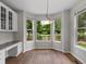 Charming breakfast nook featuring three large windows with a serene outdoor view at 6700 W Dorado Dr # 47, Littleton, CO 80123