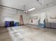 Clean garage with shelving and space for multiple vehicles or storage at 6700 W Dorado Dr # 47, Littleton, CO 80123