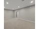 Neutral living room featuring neutral paint, carpet, and recessed lighting at 6700 W Dorado Dr # 47, Littleton, CO 80123