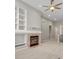 Inviting living room with a fireplace, built-in shelving, and an open floor plan, perfect for Gathering gatherings at 6700 W Dorado Dr # 47, Littleton, CO 80123