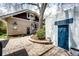 Charming backyard featuring a brick patio and landscaped garden area at 780 N Franklin St, Denver, CO 80218