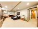 Finished basement featuring plush seating, neutral carpet, and ample recessed lighting at 780 N Franklin St, Denver, CO 80218