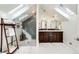 A spacious bathroom with a tiled shower, marble countertops, and skylights at 780 N Franklin St, Denver, CO 80218