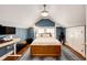 Bedroom features a cozy atmosphere with a bed, study area, and a patterned rug at 780 N Franklin St, Denver, CO 80218
