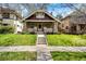 Inviting brick home with a well-maintained front yard and a cozy porch for relaxing at 780 N Franklin St, Denver, CO 80218