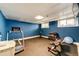 Home gym features rubber flooring, exercise equipment, and natural light for workouts at 780 N Franklin St, Denver, CO 80218