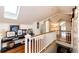 Hallway features hardwood floors, skylight and a white staircase railing at 780 N Franklin St, Denver, CO 80218