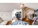 Spacious walk-in closet with hardwood floors and custom closet organizers at 780 N Franklin St, Denver, CO 80218