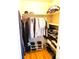 Well-organized closet with clothing racks, shelves, and a variety of shoes and apparel at 1936 S Poplar St, Denver, CO 80224