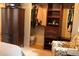 Bedroom closet with organizers, hanging rods, drawers, and shoe storage at 1936 S Poplar St, Denver, CO 80224