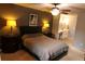 Comfortable bedroom with ceiling fan and vanity area at 1936 S Poplar St, Denver, CO 80224