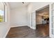 Home office featuring high ceiling, french doors, and a scenic view at 1820 Newland Ct # 210, Lakewood, CO 80214