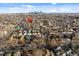 Bird's eye view of the neighborhood and distant city skyline at 2238 Newton St, Denver, CO 80211