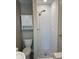 Modern bathroom features updated tile shower and fixtures at 2238 Newton St, Denver, CO 80211