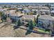 Expansive aerial view of a multi-story home, showcasing its outdoor spaces, and neighborhood at 7009 Winter Ridge Pl, Castle Pines, CO 80108