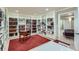 Charming library features built-in bookshelves and a cozy reading nook at 7009 Winter Ridge Pl, Castle Pines, CO 80108