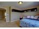 Bedroom with a window and a built-in shelving unit at 25994 E Peakview Pl, Aurora, CO 80016