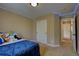 Bedroom featuring closet doors and entryway at 25994 E Peakview Pl, Aurora, CO 80016