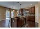 Beautiful kitchen with stainless steel appliances, a center island, and a seamless flow to the outdoors at 25994 E Peakview Pl, Aurora, CO 80016
