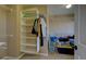 Walk-in closet with ample shelving and storage for organized living at 25994 E Peakview Pl, Aurora, CO 80016