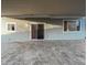 Covered back patio with a tiled floor and access to the home's interior at 19512 E 58Th Dr, Aurora, CO 80019