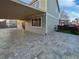 Spacious covered back patio and portion of the artificial grass-covered back yard at 19512 E 58Th Dr, Aurora, CO 80019