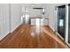 Spacious dining area includes an open floorplan, recessed lighting, and sliding door access to the backyard patio at 19512 E 58Th Dr, Aurora, CO 80019