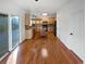 Kitchen boasts hardwood floors, center island, stainless steel appliances and access to the dining and living rooms at 19512 E 58Th Dr, Aurora, CO 80019