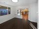 View of living room with large windows, open floorplan, and elegant tile flooring at 19512 E 58Th Dr, Aurora, CO 80019