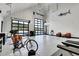Expansive garage with natural light from windows, featuring ample parking and storage at 5166 Bear Mountain Dr, Evergreen, CO 80439
