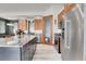 Modern kitchen boasting a large island, stainless steel appliances, and plenty of counter space at 5166 Bear Mountain Dr, Evergreen, CO 80439