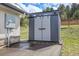 Exterior view of a large, modern outdoor shed with double doors for ample storage at 5166 Bear Mountain Dr, Evergreen, CO 80439