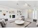 Spacious living room boasts built-in shelving, a fireplace, and stylish furnishings at 7158 W Roxbury Ave, Littleton, CO 80128