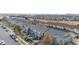 Charming townhomes featuring cozy patios and well-manicured front yards at 17922 E 104Th Pl # D, Commerce City, CO 80022