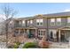 Stylish townhome with well-maintained landscaping and charming fence at 17922 E 104Th Pl # D, Commerce City, CO 80022
