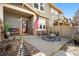 Inviting front porch with seating area and American flag offers a warm welcome at 17922 E 104Th Pl # D, Commerce City, CO 80022