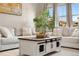 Comfortable living room with stylish furnishings and lots of natural light at 17922 E 104Th Pl # D, Commerce City, CO 80022