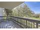 A sunny balcony overlooks a neighborhood and a blooming tree at 3363 Oneal Pkwy # 36, Boulder, CO 80301