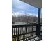 Balcony with a view of a tennis court and mountains at 3363 Oneal Pkwy # 36, Boulder, CO 80301