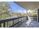 A balcony with a view of the neighborhood and flowering trees at 3363 Oneal Pkwy # 36, Boulder, CO 80301