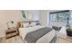 Serene bedroom with a modern decor, large window and neutral colors at 3363 Oneal Pkwy # 36, Boulder, CO 80301