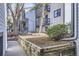Attractive condo building featuring private balconies and manicured landscaping at 3363 Oneal Pkwy # 36, Boulder, CO 80301
