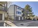 Well-maintained condo complex with attached garages, balconies, and ample parking at 3363 Oneal Pkwy # 36, Boulder, CO 80301