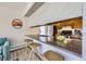 Kitchen counter with granite countertops, wood cabinetry, and stainless steel refrigerator at 3363 Oneal Pkwy # 36, Boulder, CO 80301