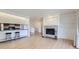Spacious living area with fireplace, bar seating, and an open floor plan to the kitchen at 3363 Oneal Pkwy # 36, Boulder, CO 80301