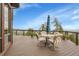 Outdoor deck offers a relaxing seating area and breathtaking views of the surrounding landscape at 13954 Pine Country Ln, Conifer, CO 80433