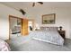 Spacious primary bedroom featuring a walk-in closet and vaulted ceiling at 13954 Pine Country Ln, Conifer, CO 80433