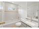 Cozy bathroom showcases a tub, toilet, and a vanity with white sink at 8073 S Albion St, Centennial, CO 80122