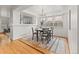 Elegant dining room with hardwood floors, stylish chandelier, and ample natural light at 8073 S Albion St, Centennial, CO 80122